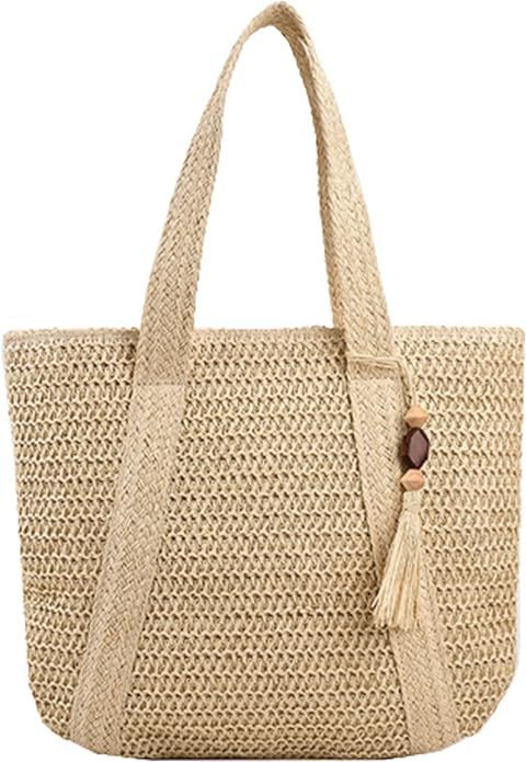 Bolso de paja para mujer con borlas tejidas en la playa