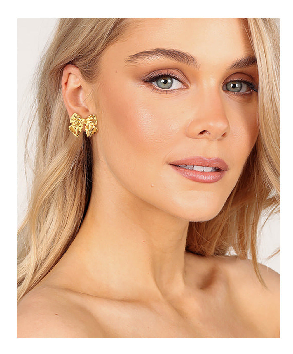 Cuivre chaud 18K de boucles d'oreilles d'arc de style européen et américain