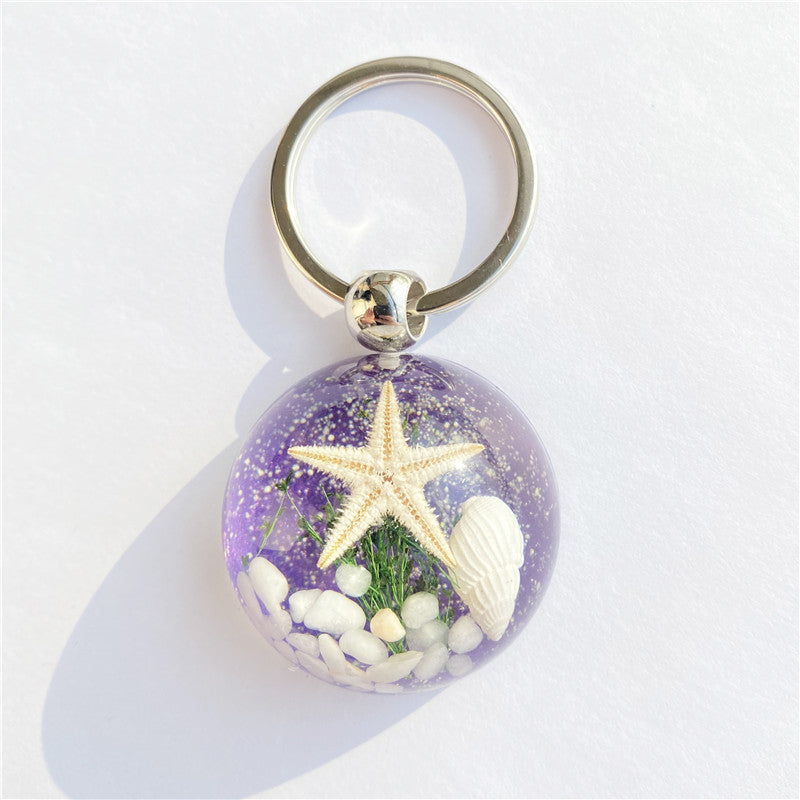 Colgante de llavero de ámbar de estrella de mar