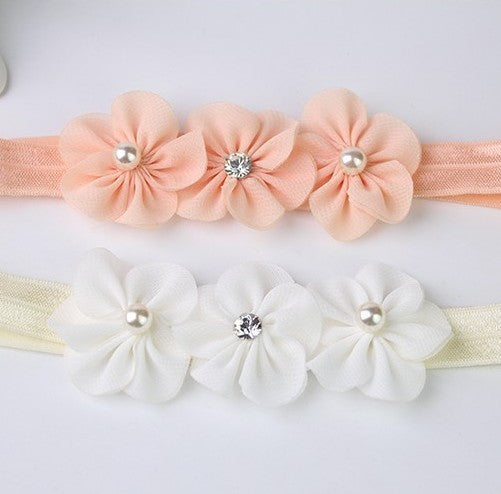 Bandeau bébé trois petites fleurs de prunier