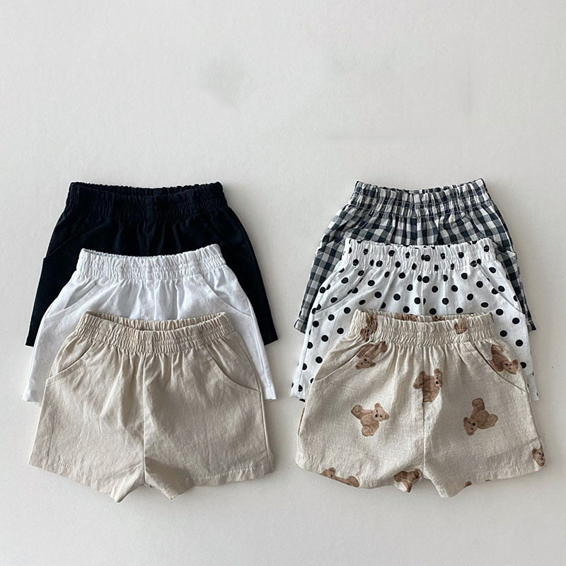 Ins Baby pantalones cortos sueltos finos de algodón y lino estilo infantil