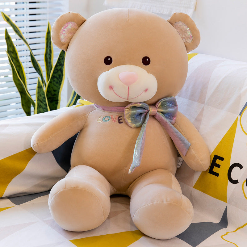 Jouet en peluche gros ours avec nœud de dessin animé