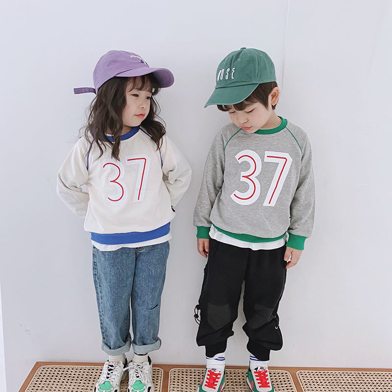 Ropa para niños al por mayor otoño nuevos niños suéter de cuello redondo niña bebé 37 letras color a juego suéter de niños coreanos