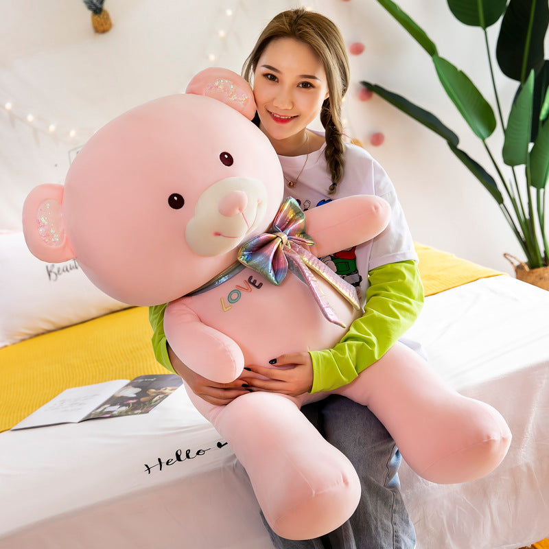 Jouet en peluche gros ours avec nœud de dessin animé