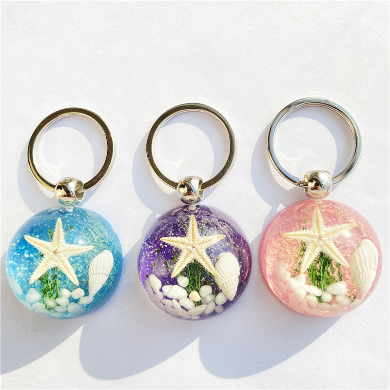 Colgante de llavero de ámbar de estrella de mar