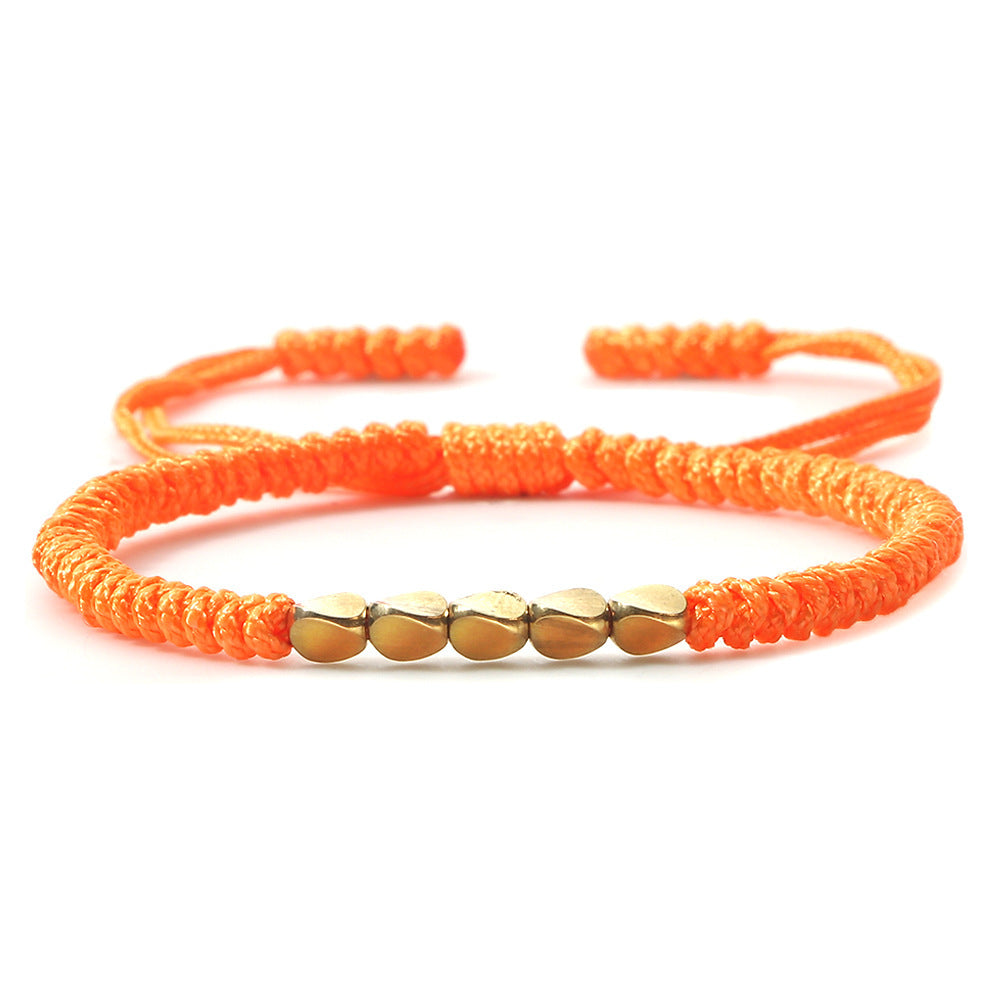 Bracelet perlé en perles de cuivre de forme irrégulière tissé à la main
