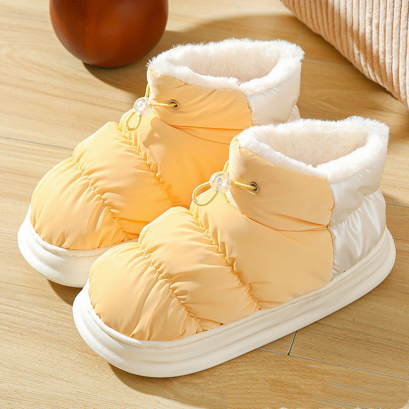 Bottes de neige pour femmes portant un tissu en duvet imperméable et coupe-vent en hiver