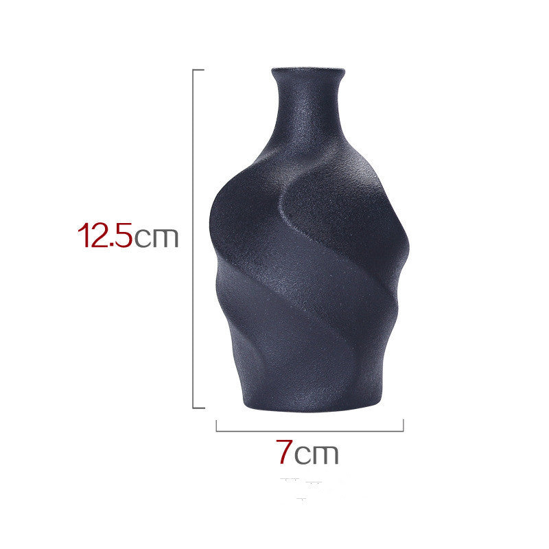 Vase en céramique simulant un vase à fleurs sèches