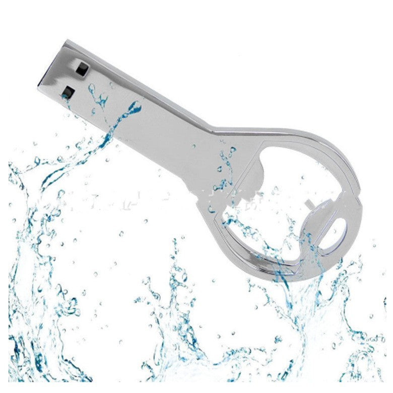 Unidad de abrebotellas con llave de metal