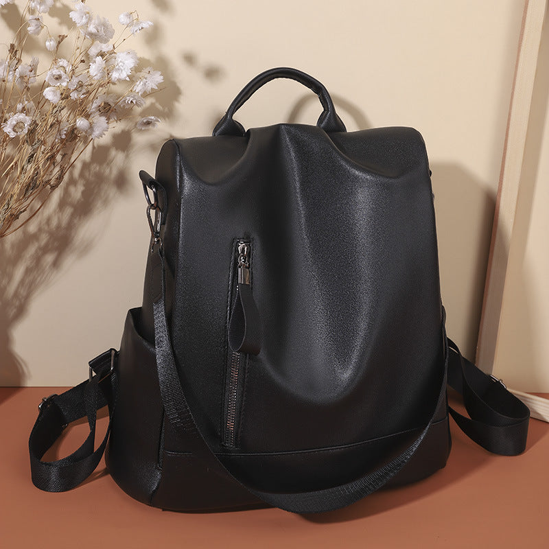Bolso de mujer PU Mochila con textura de cuero suave Moda estilo de Hong Kong Gran capacidad