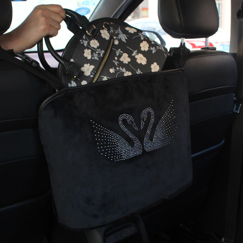 Storage net pocket between car seats