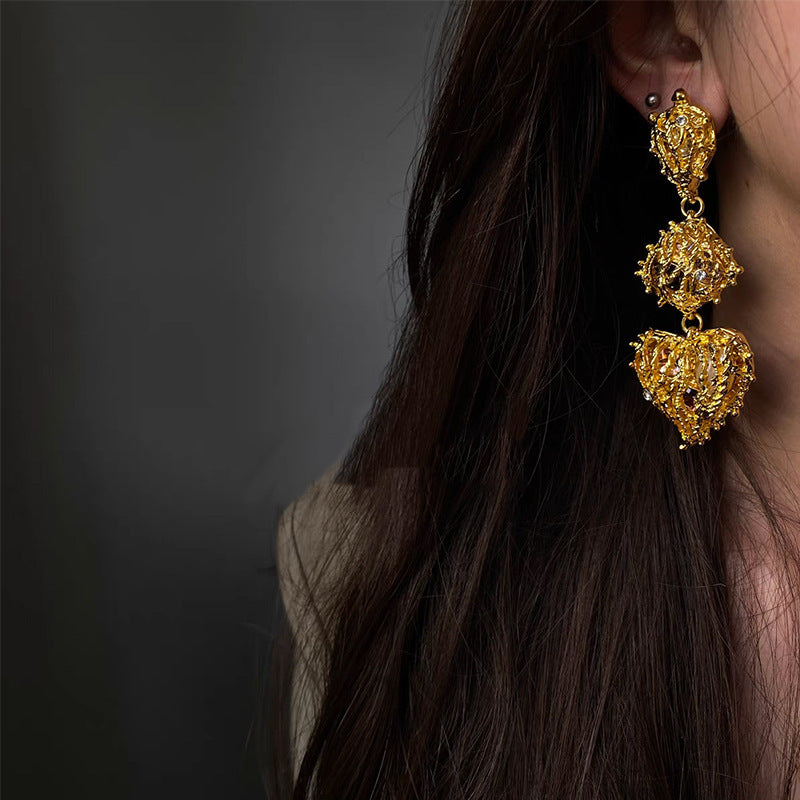 Eye-catching Hollow Love Design Sense Earrings