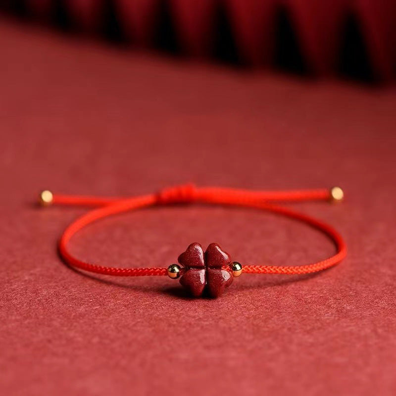 Bracelet corde rouge trèfle cinabre
