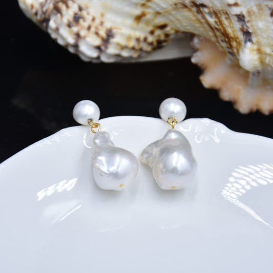Boucles d'oreilles à tige en perles de queue baroques exagérées
