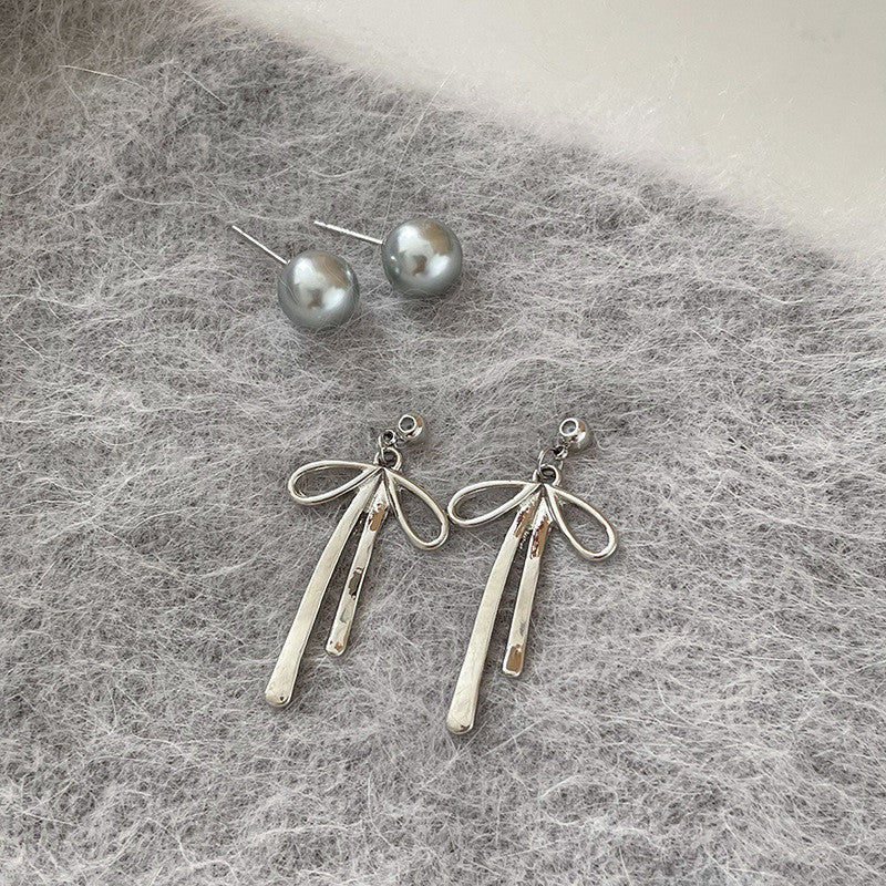 Boucles d'oreilles à aiguille en argent, Niche, nœud, perle féminine