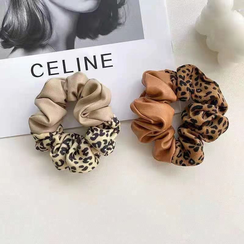 Anillo para el cabello del intestino grueso con bloques de color nuevo y costuras de cuero con estampado de leopardo