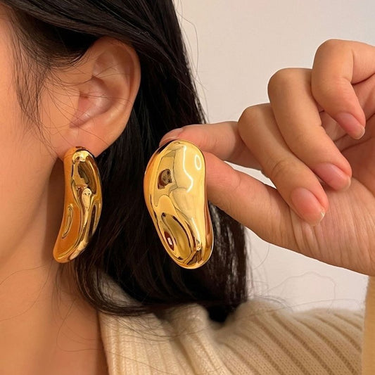 Boucles d'oreilles asymétriques torsadées ondulées de style vintage français