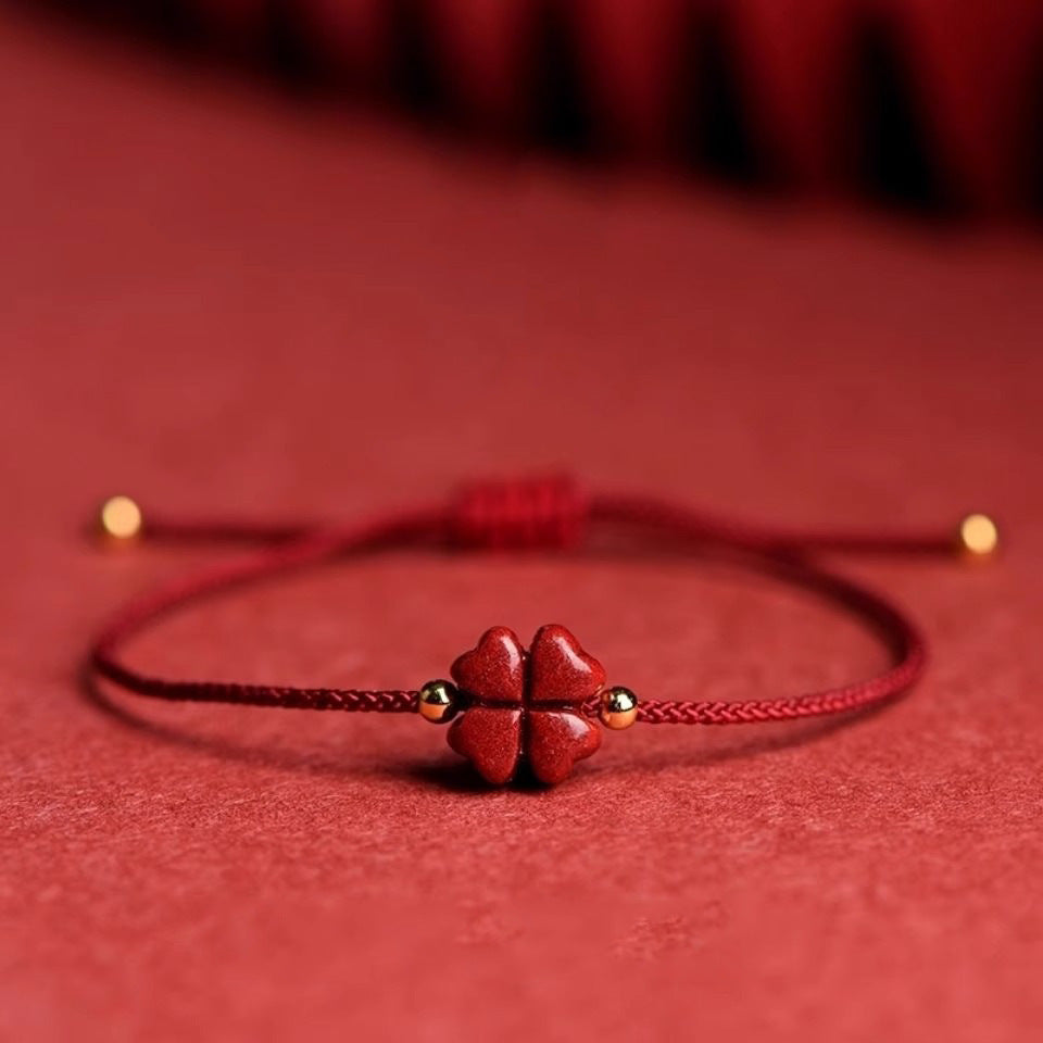 Bracelet corde rouge trèfle cinabre
