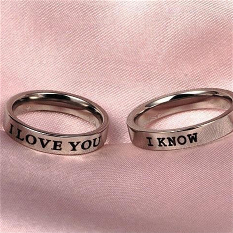 Bague de couple de couple de niche simple en acier titane