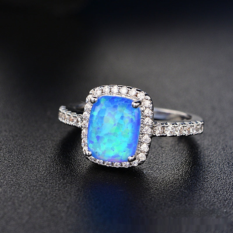 Anillo de ópalo de diamante rosa multicolor europeo y americano circonita con incrustaciones de moda Simple