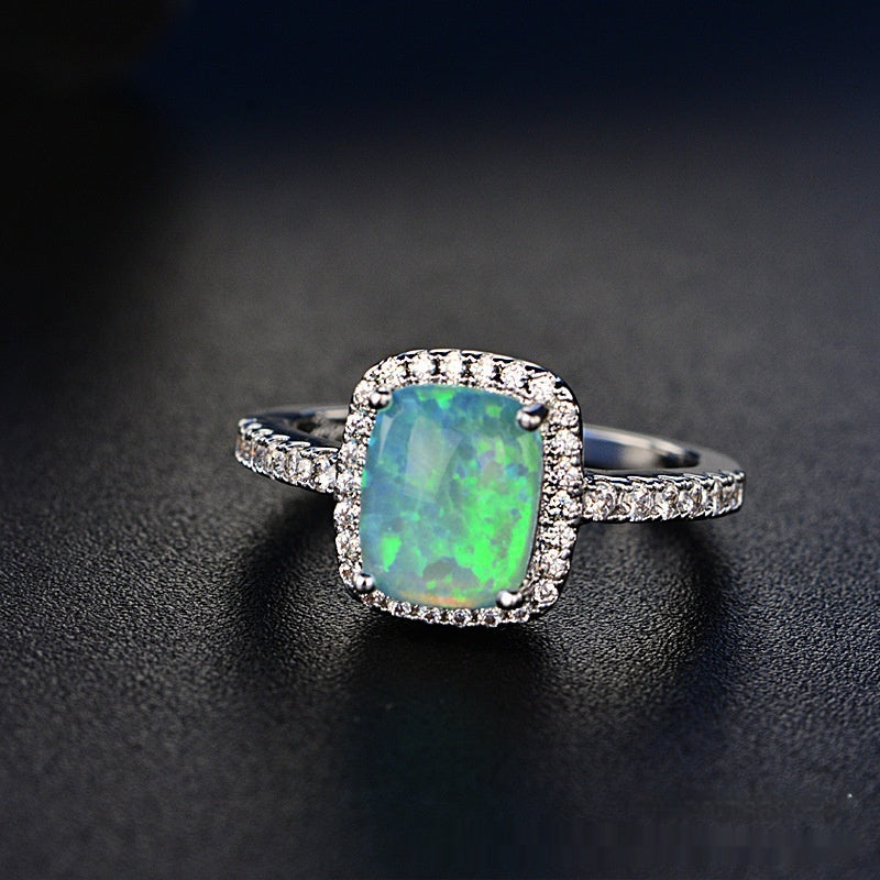 Anillo de ópalo de diamante rosa multicolor europeo y americano circonita con incrustaciones de moda Simple