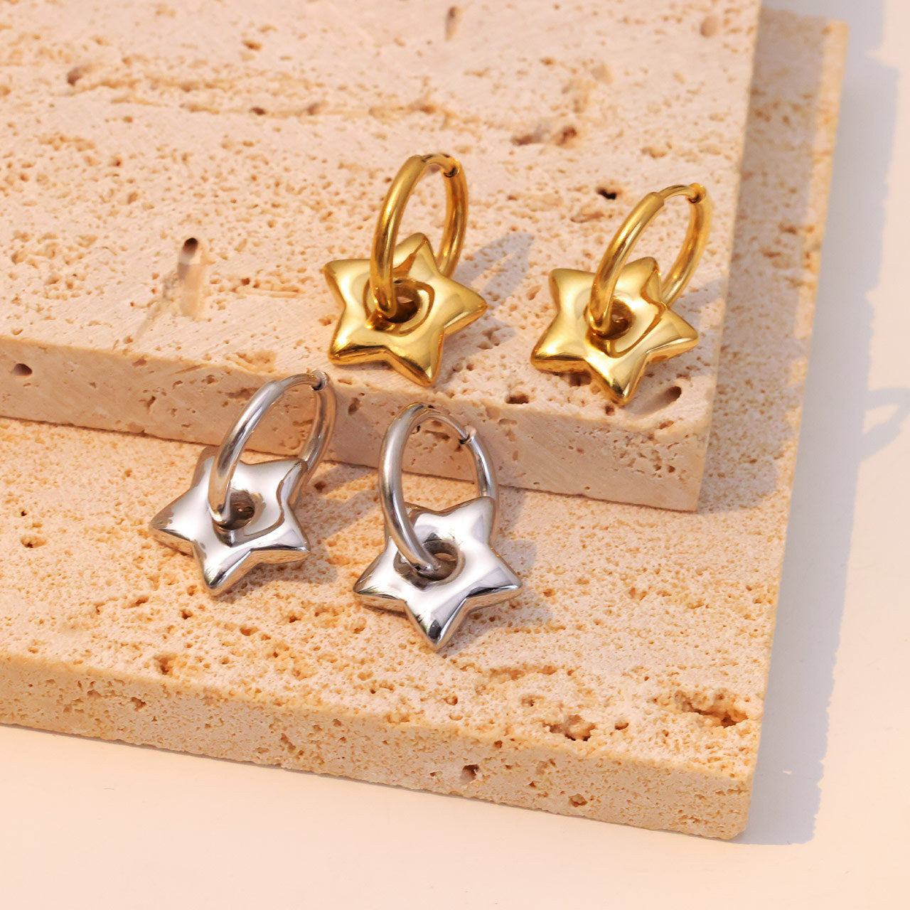 Boucles d'oreilles étoiles en acier titane assorties à la mode
