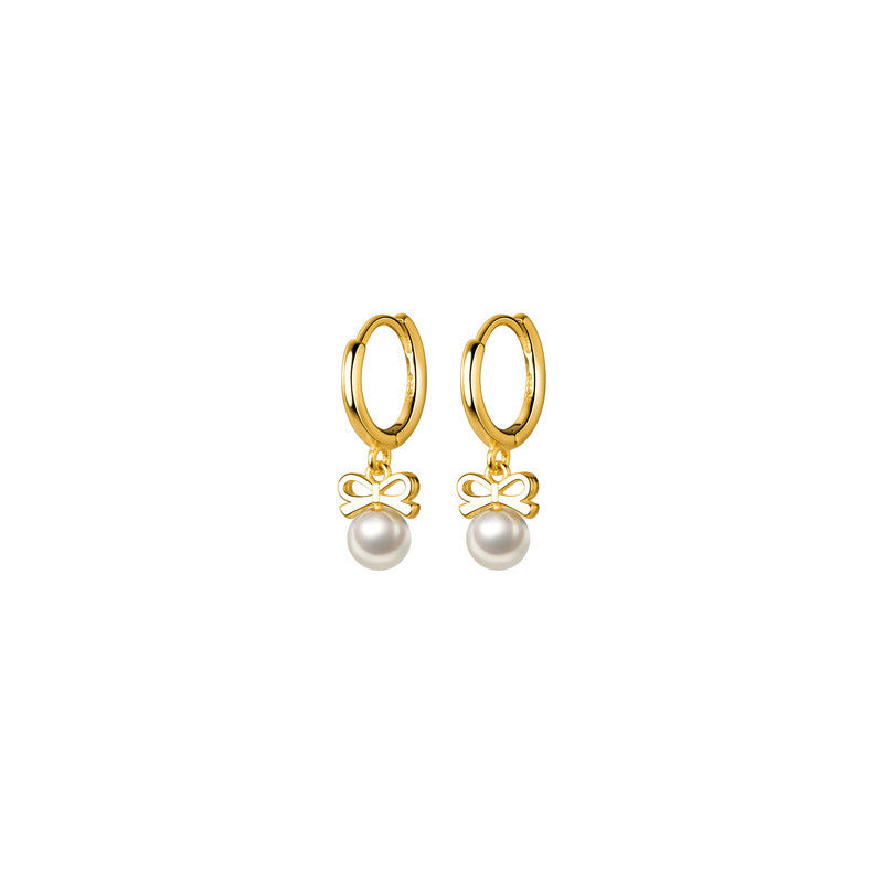 Boucles d'oreilles en perles artificielles avec nœud exquis