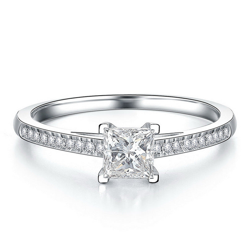 Anillo de diamantes de alta simulación de cuatro garras de moda simple para mujer