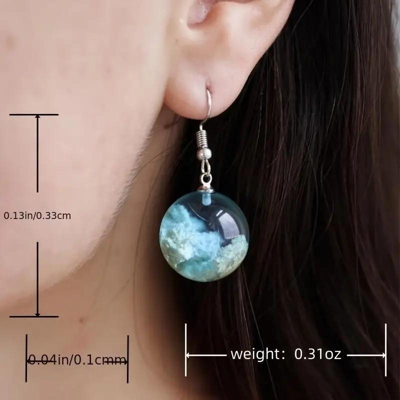 Boucles d'oreilles à tige en résine sphérique transparente de style Mori