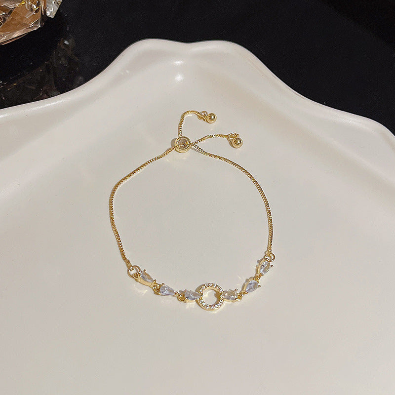 Pulsera versátil de perlas y flores de circón