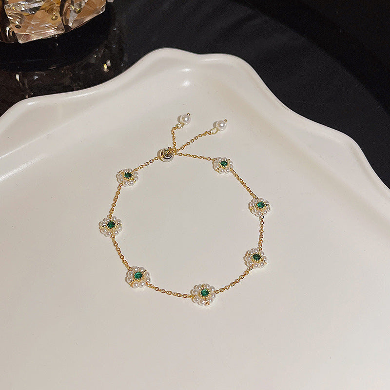 Pulsera versátil de perlas y flores de circón