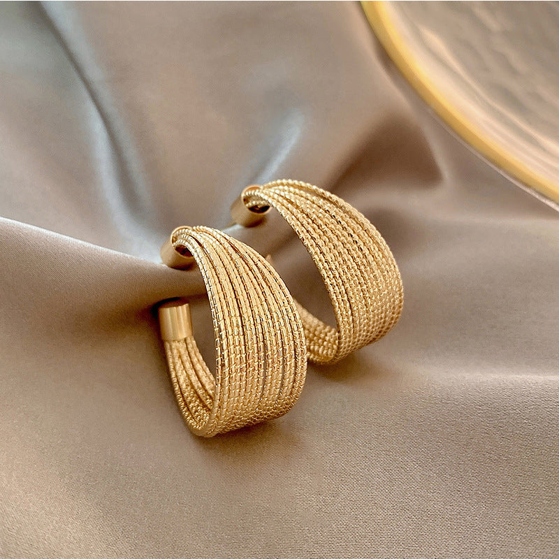 Bague métal aiguille argent boucles d'oreilles généreuses femme