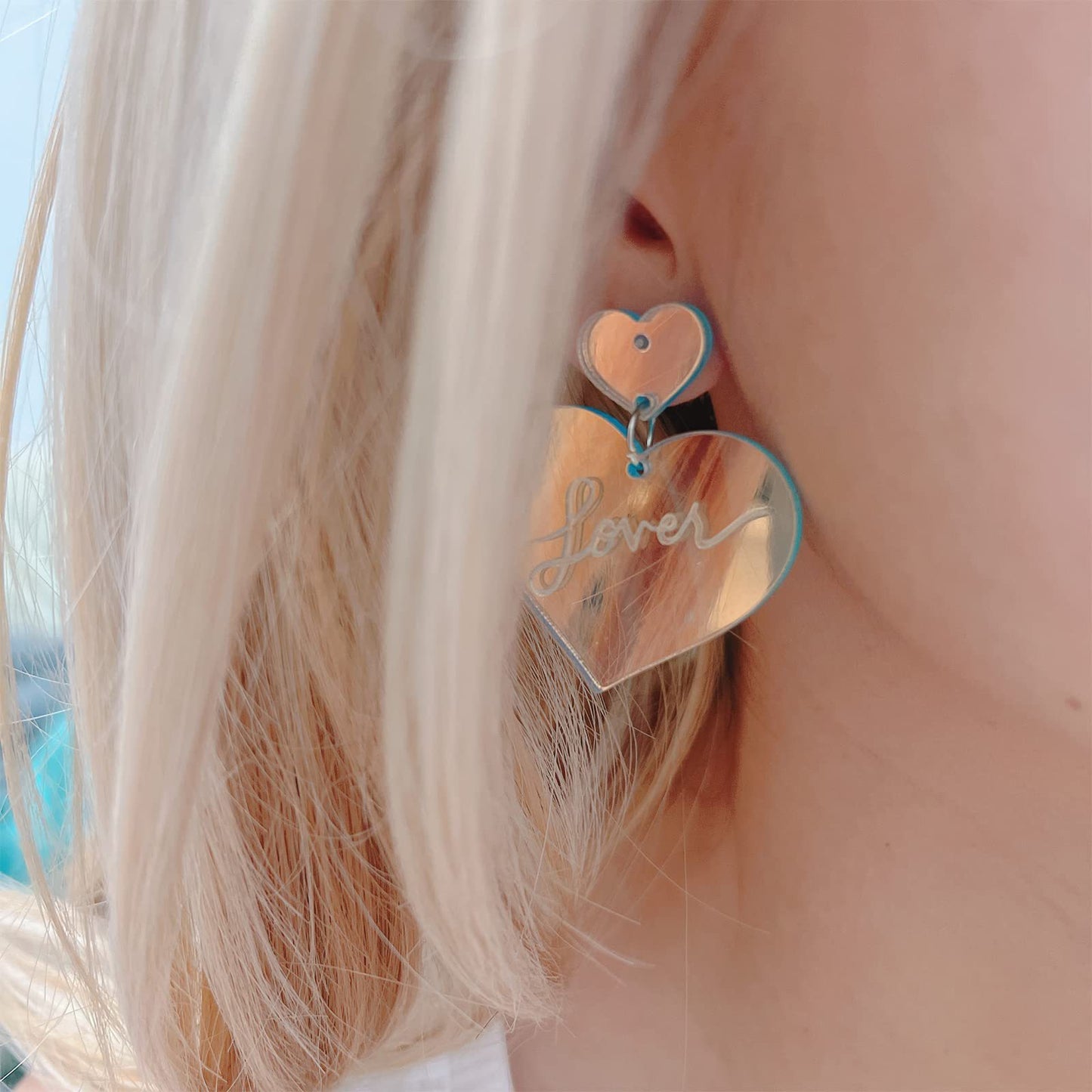 Boucles d'oreilles exagérées en acrylique à changement de couleur au laser coloré