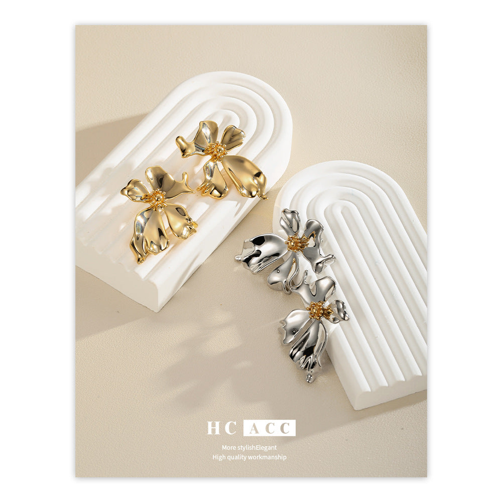 Pendientes de flores de metal Pendientes de lujo de alta calidad con luz de pétalos para mujer