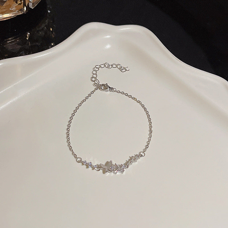 Pulsera versátil de perlas y flores de circón