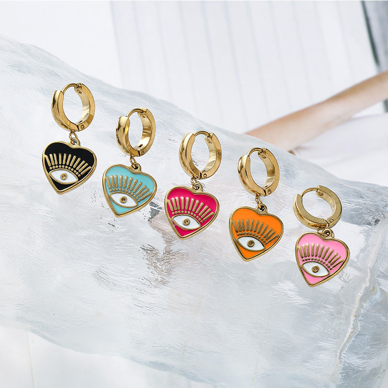Boucles d'oreilles dégoulinantes personnalisées à la mode, nouvelle femme avec des yeux de cœur