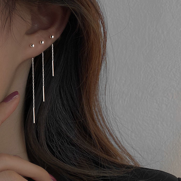 Línea de oreja larga simple para mujer de alto sentido