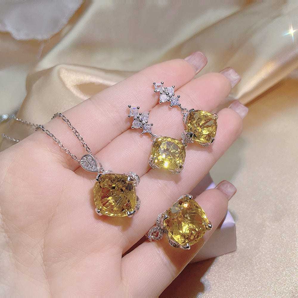 Pendentif aigue-marine et topaze, costume de diamant jaune