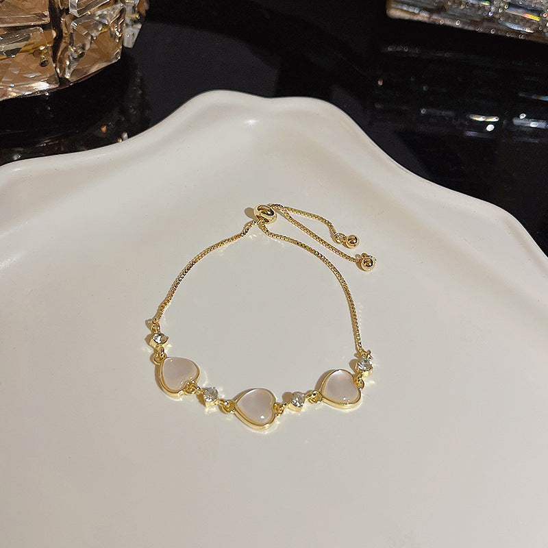 Pulsera versátil de perlas y flores de circón