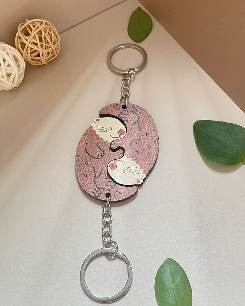 Llavero de nutria de pareja de madera de simulación creativa