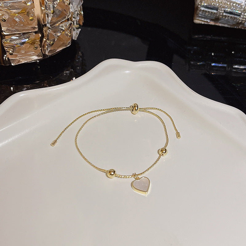 Pulsera versátil de perlas y flores de circón