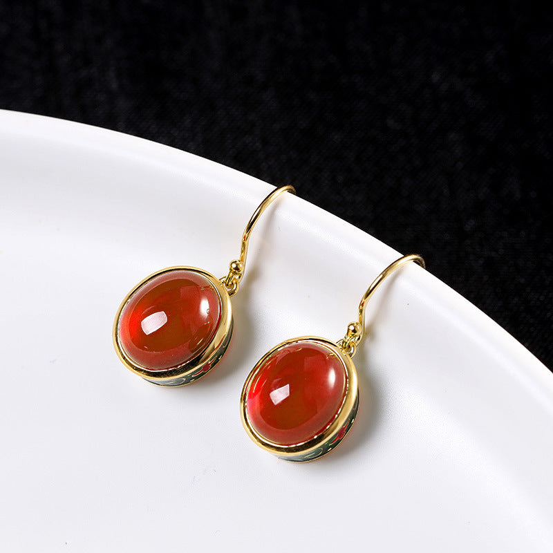 Boucles d'oreilles rubis dorées en argent sterling