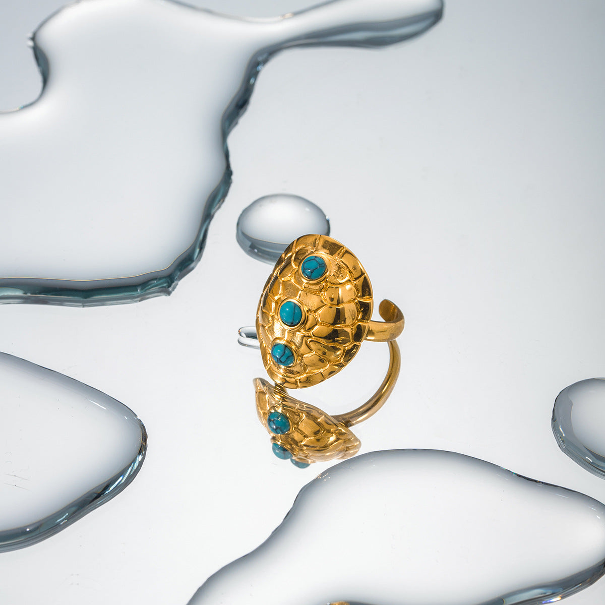 Anillo de apertura de caparazón de tortuga turquesa con incrustaciones de acero inoxidable