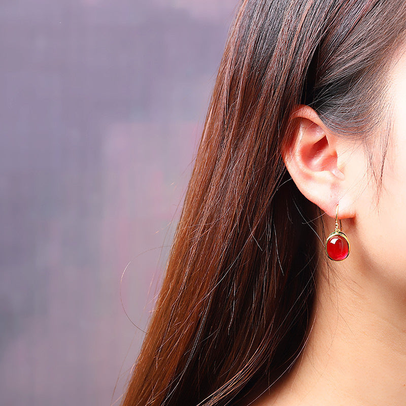 Boucles d'oreilles rubis dorées en argent sterling