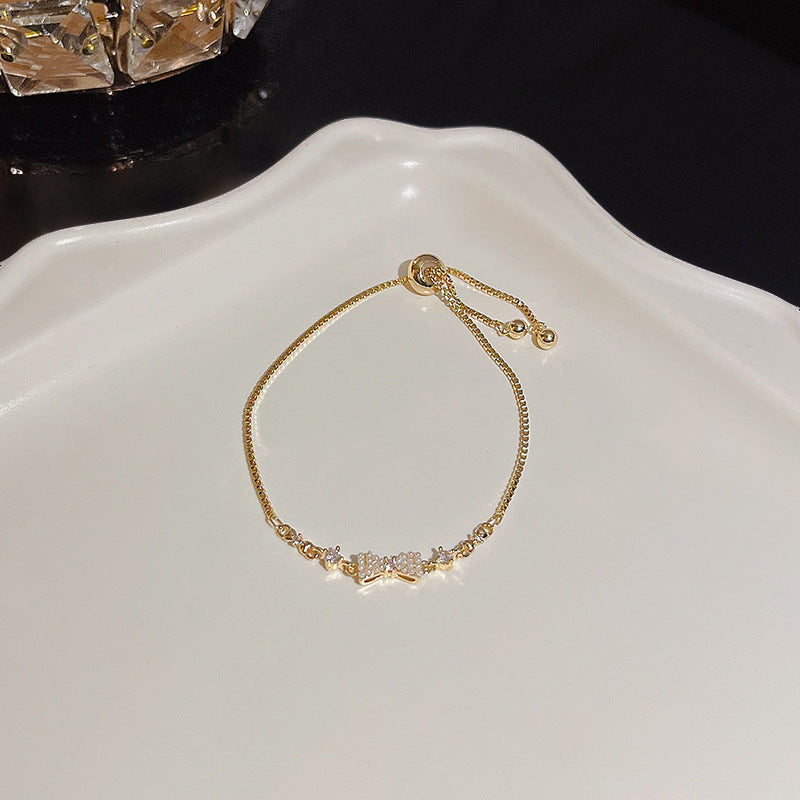 Pulsera versátil de perlas y flores de circón