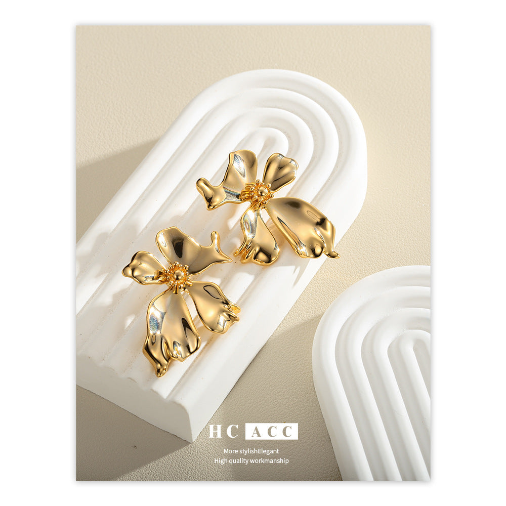 Pendientes de flores de metal Pendientes de lujo de alta calidad con luz de pétalos para mujer