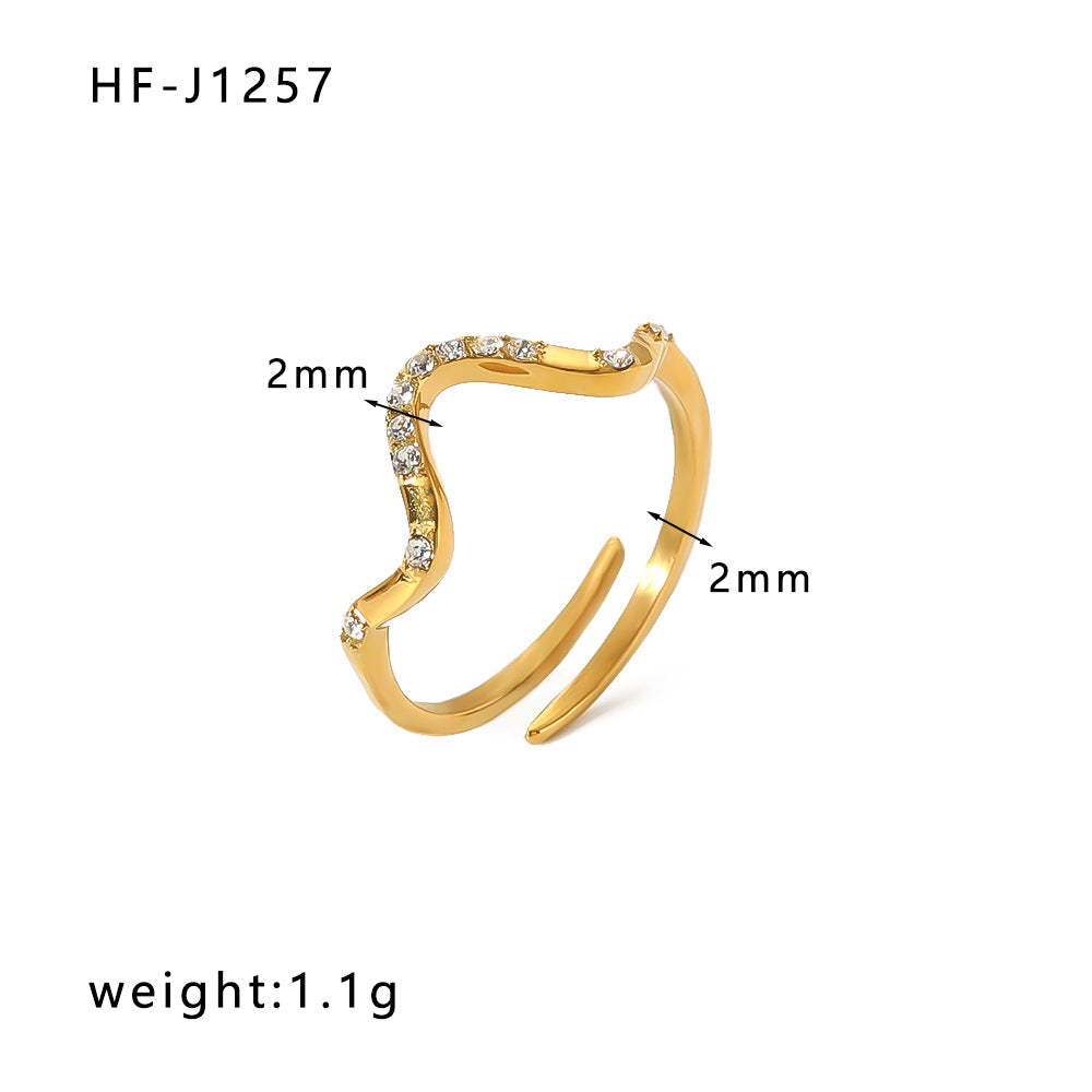Anillo de diamantes de acero inoxidable chapado en oro de 18 quilates con incrustaciones de circón