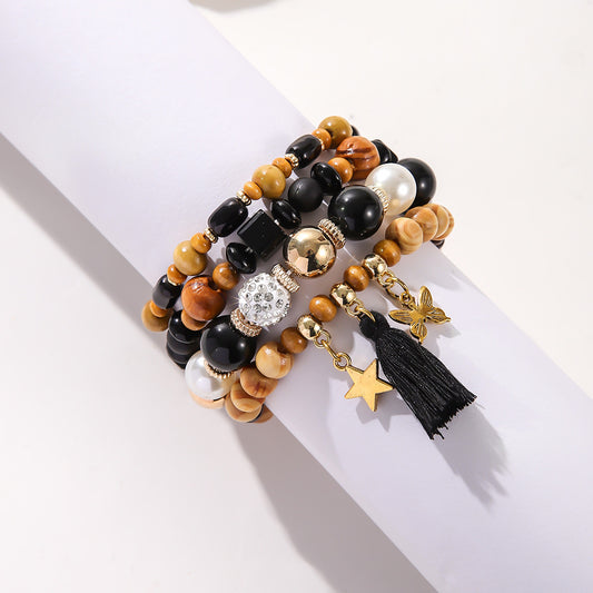 Costume de bracelet ethnique en perles de bois et pompon