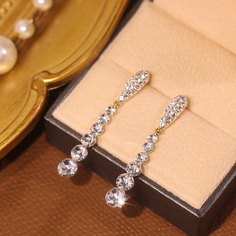 Boucles d'oreilles à pampilles longues en strass de haute qualité avec aiguille en argent sterling