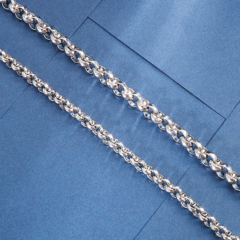 Bracelet pour homme en acier titane avec chaîne à surface multi-coupe